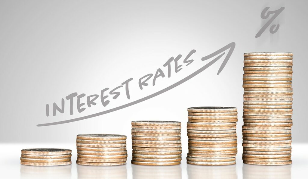 Image of stacked coins with “Interest Rate” written above