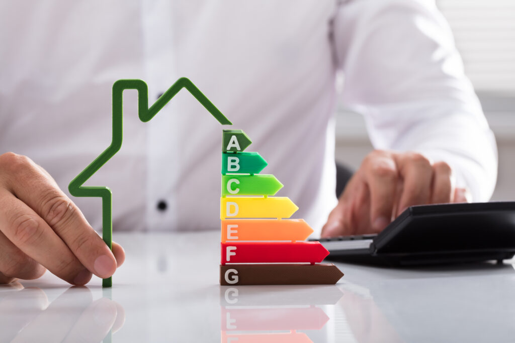 Business person adjusting energy efficiency chart